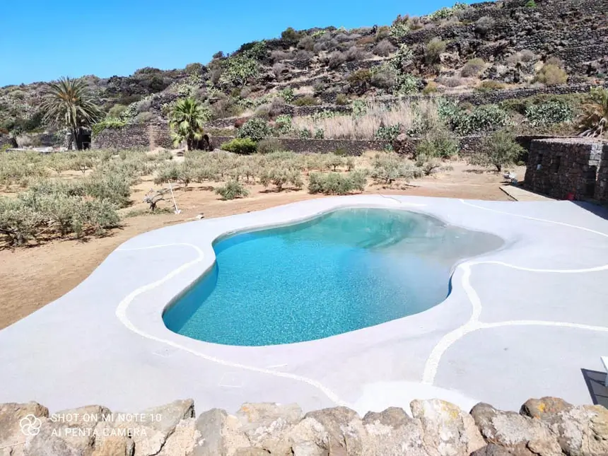 Private beach-entry sand pool